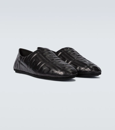 Shop Fendi Ff Embossed Leather Slippers In Black