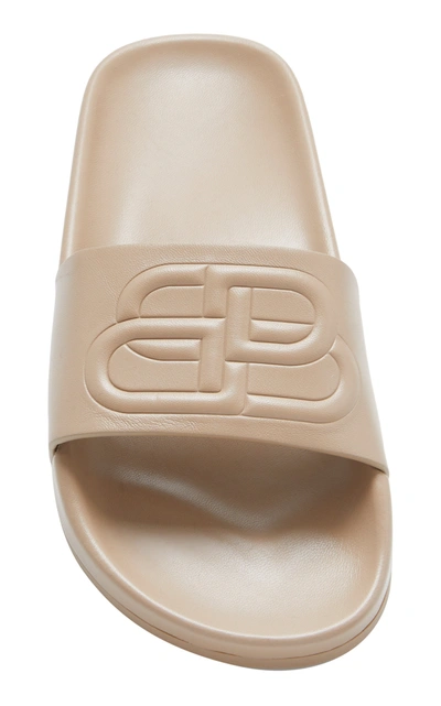 Shop Balenciaga Logo-embossed Leather Slides In Nude