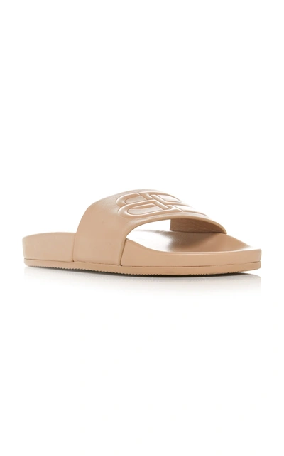 Shop Balenciaga Logo-embossed Leather Slides In Nude
