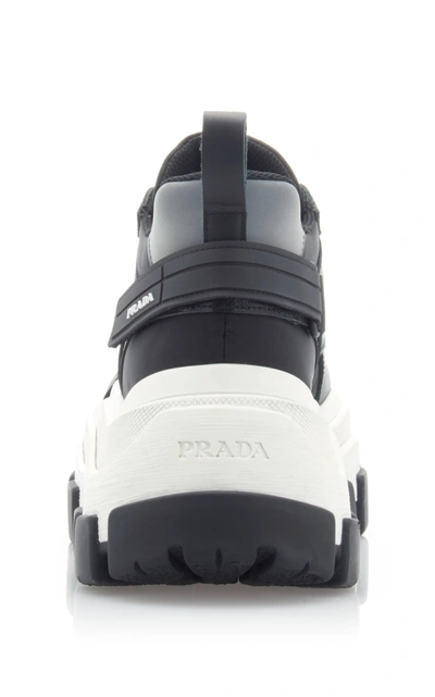 Shop Prada Leather And Rubber Platform Sneakers In Black