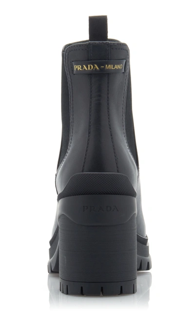 Shop Prada Women's Leather And Rubber Platform Ankle Boots In Black