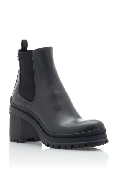 Shop Prada Women's Leather And Rubber Platform Ankle Boots In Black