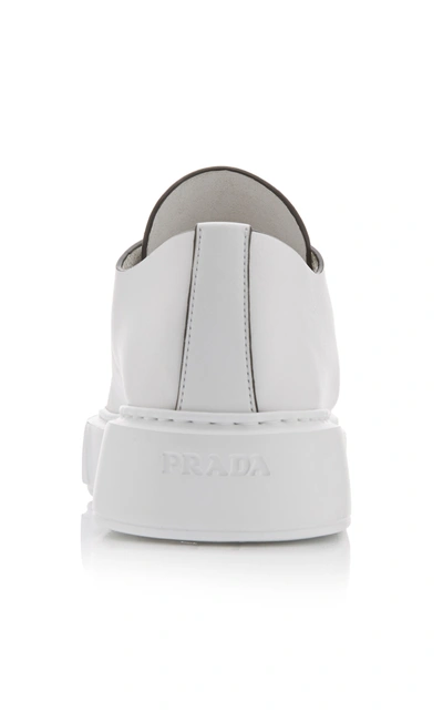 Shop Prada Women's Minimal Leather Trainers In Black,white