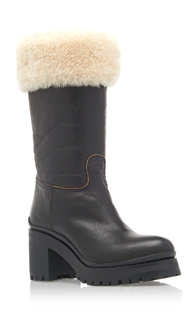 Shop Miu Miu Shearling-trimmed Leather Boots In Black