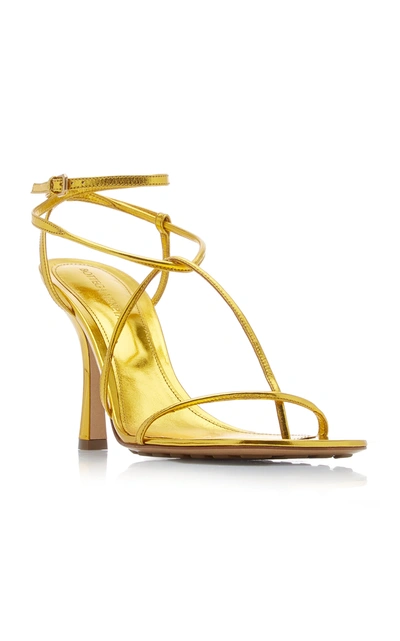 Shop Bottega Veneta The Line Sandals In Gold