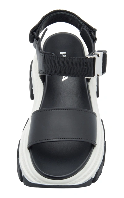 Shop Prada Buckled Leather And Rubber Sandals In Black,white