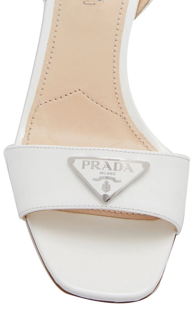 Shop Prada Appliquã©d Patent Leather Sandals In White