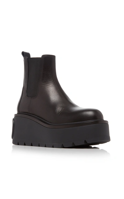 Shop Valentino Garavani Uniqueform Leather Boots In Black