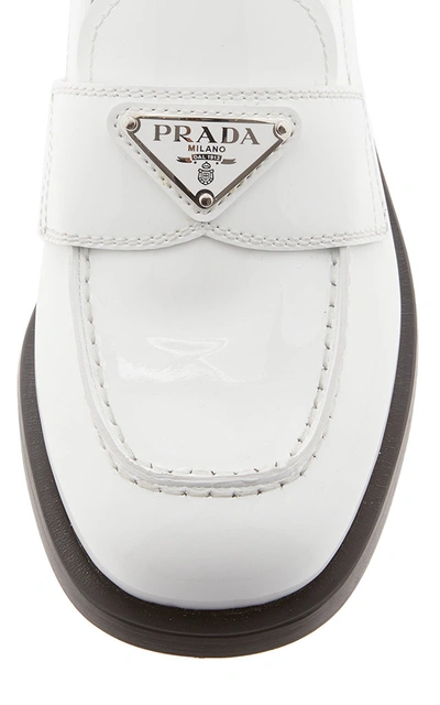 Shop Prada Logo-detailed Patent Leather Loafers In White