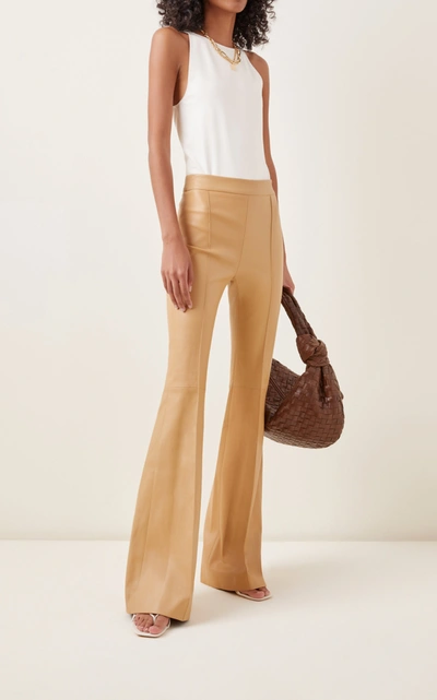 Shop Rosetta Getty Pin-tucked Leather Flared-leg Pants In Neutral