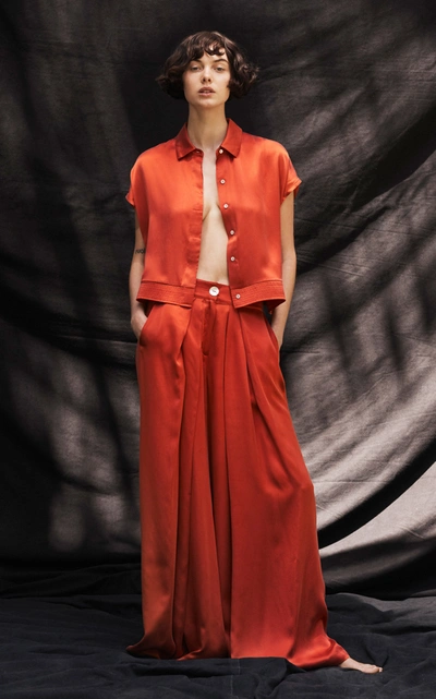 Shop Bird & Knoll Raphaelle Pleated Silk Wide-leg Pants In Orange