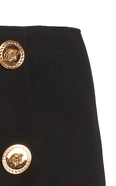 Shop Versace 3-button Crepe Mini Skirt In Black