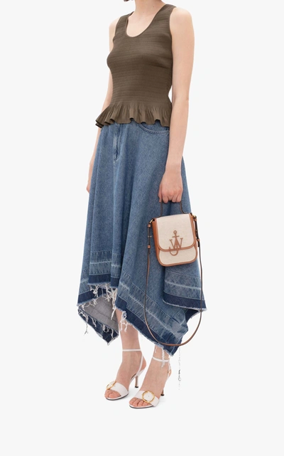 Shop Jw Anderson Women's Released-hem Denim Midi Skirt In Medium Wash