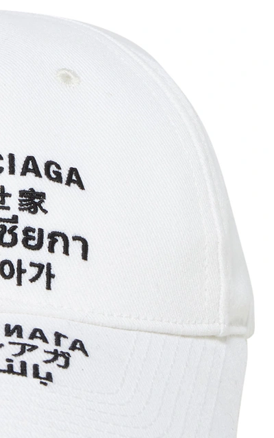 Shop Balenciaga Women's Embroidered Multilingual Baseball Cap In White
