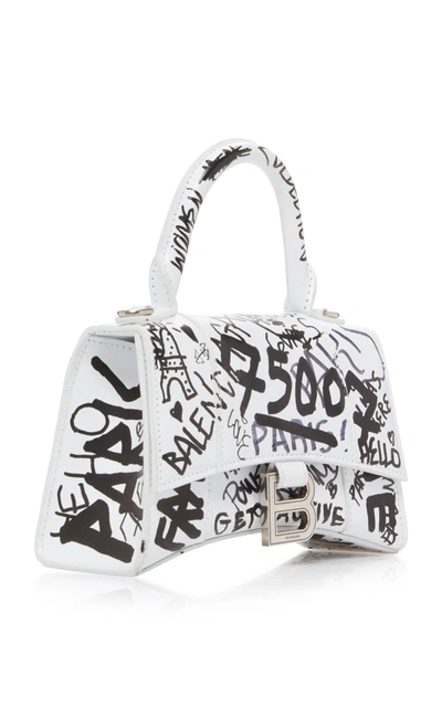 Shop Balenciaga Hourglass Xs Graffiti-print Leather Bag In White