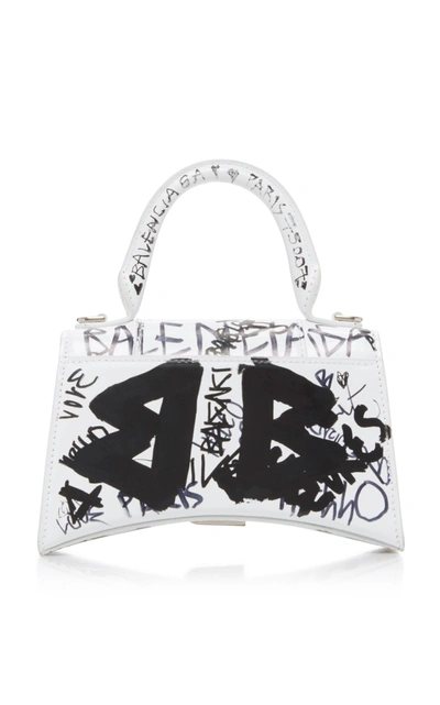 Shop Balenciaga Hourglass Xs Graffiti-print Leather Bag In White