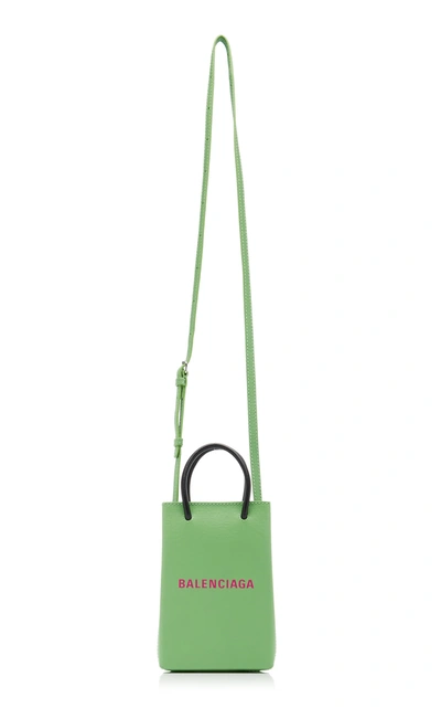 Shop Balenciaga Shopping Logo-print Leather Phone Holder In Green