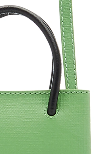 Shop Balenciaga Shopping Logo-print Leather Phone Holder In Green