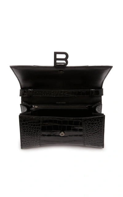 Shop Balenciaga Hourglass Baguette Croc-effect Leather Bag In Black