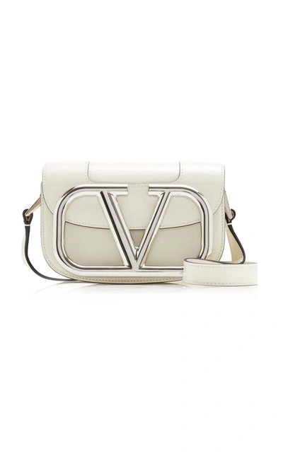 Shop Valentino Garavani Supervee Small Patent Leather Shoulder Bag In Ivory