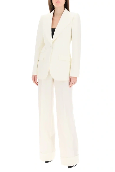 Shop Dolce & Gabbana Flare Wool Trousers In White