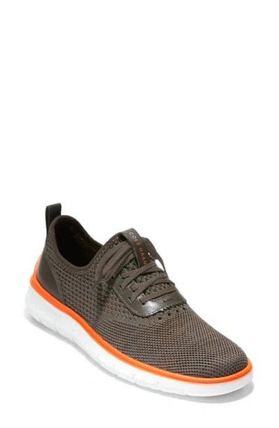 Shop Cole Haan Generation Zerogrand Stitchlite Sneaker In Black Olive/ Orange/ White