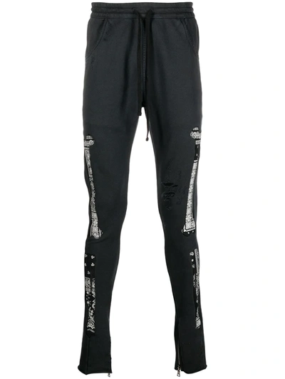 Shop Alchemist Bandana-print Ripped Track-pants In Black