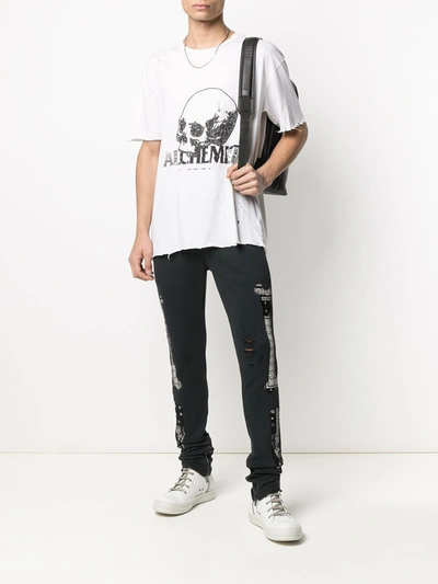 Shop Alchemist Bandana-print Ripped Track-pants In Black