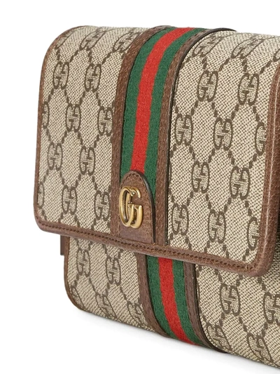 Shop Gucci Mini Ophidia Crossbody Bag In Brown