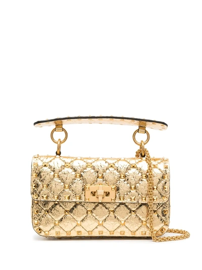 Shop Valentino Rockstud Spike Shoulder Bag In Yellow