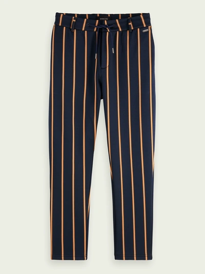 Shop Scotch & Soda Striped Mid-rise Drawstring Trousers In Green