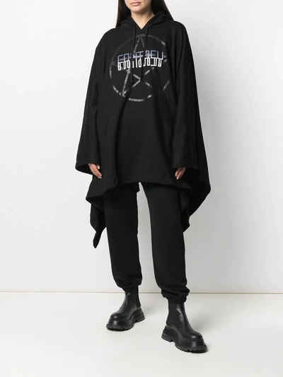 Shop Ktz Graphic-print Asymmetric Cape In Black