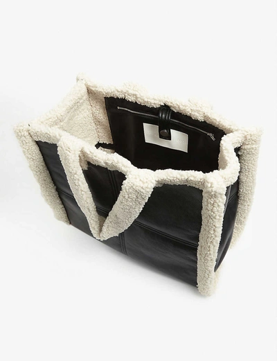 Shop Stand Studio Lola Faux-shearling Tote In Black/off+white