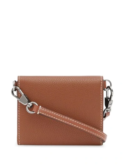 Shop Burberry Small Strap Wallet In Brown
