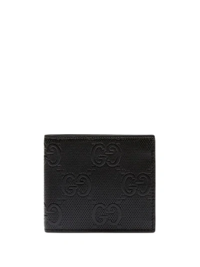 Shop Gucci Logo-embossed Wallet In Black