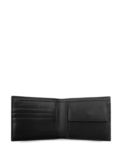 Shop Gucci Logo-embossed Wallet In Black