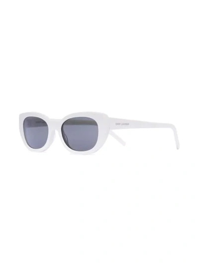 Shop Saint Laurent Betty Oval Sunglasses In White