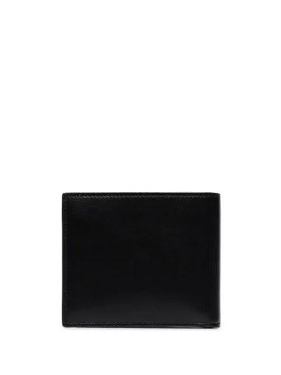 Shop Saint Laurent Logo-embossed Folding Wallet In Black
