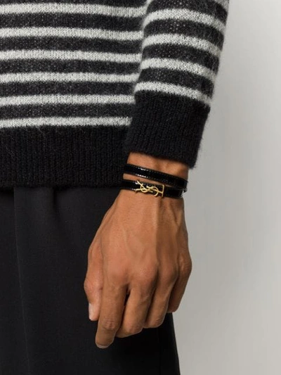 Shop Saint Laurent Monogram Double-wrap Leather Bracelet In Black