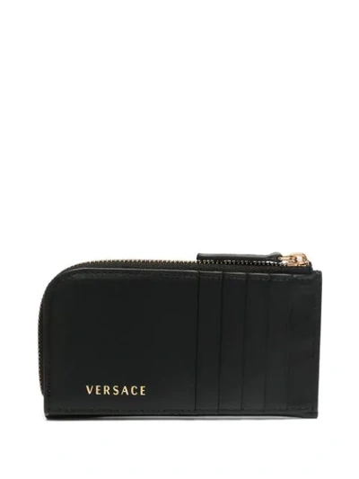 Shop Versace Medusa Stud Zipped Wallet In Black