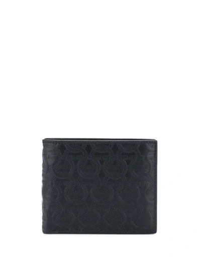 Shop Ferragamo All Over Logo Wallet In Black