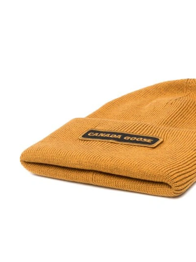 Shop Canada Goose Logo Patch Beanie In Yellow