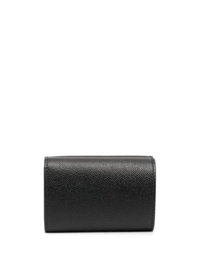 Shop Saint Laurent Monogram Plaque Compact Wallet In Black