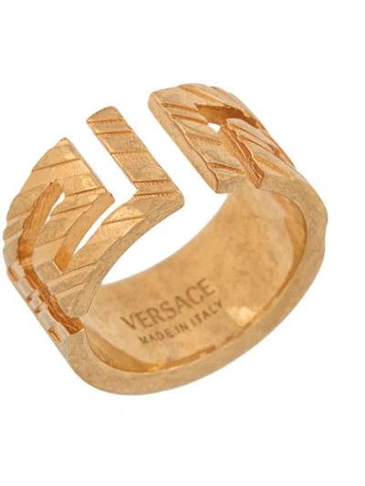 Shop Versace Meander Chunky Ring In Gold