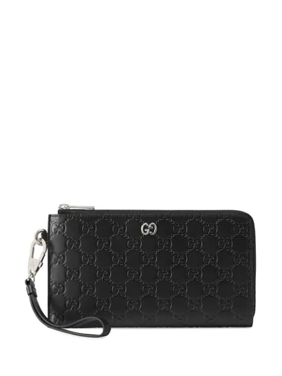 Shop Gucci Monogram Wallet Pouch In Black