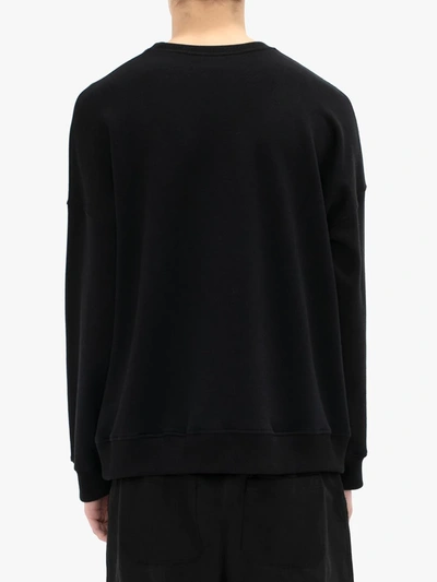 Shop Jw Anderson Slogan Print Sweatshirt In Black