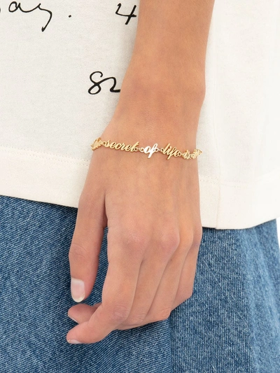 Shop Jw Anderson Slogan Cable-link Bracelet In Gold