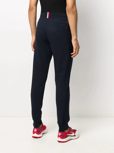 Shop Tommy Hilfiger Logo Band Track Trousers In Blue