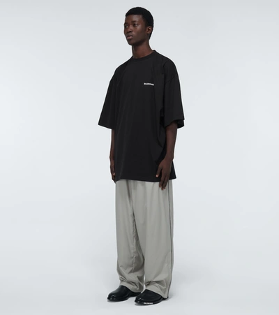 Shop Balenciaga Oversized "defile" T-shirt In Black