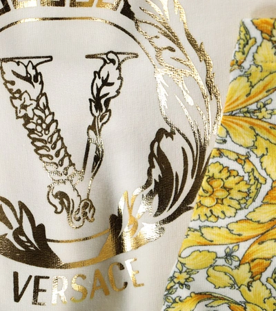 Shop Versace Baby Printed Stretch-cotton Onesie In Gold